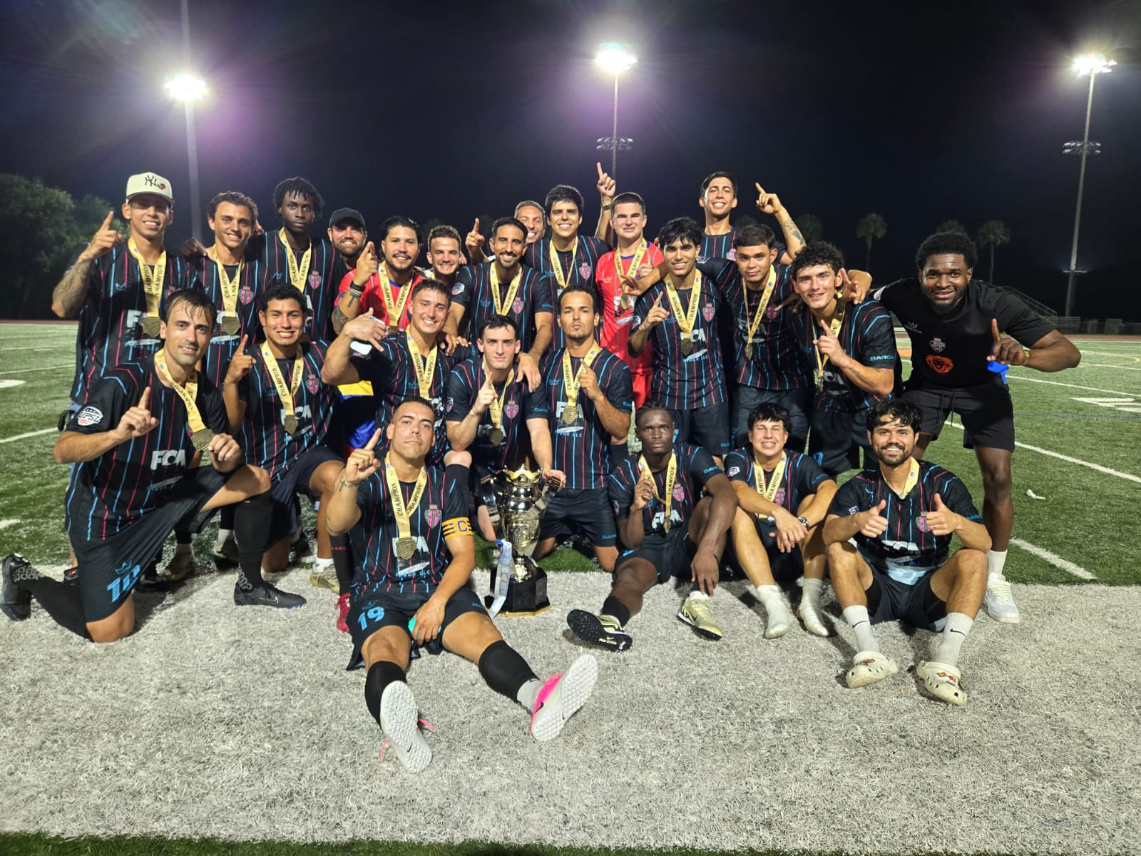 OFC Barca Premier team celebrating a championship